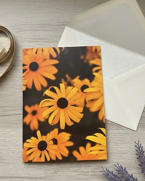 66afbe50e9c7c50c220e7101_yellow-floral-card_1779318082671.png