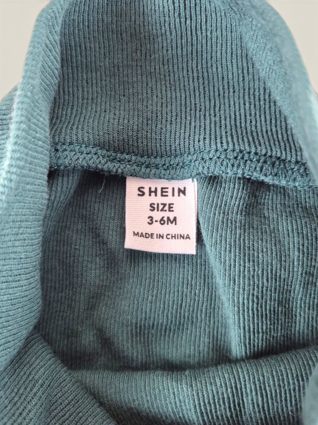 Pre-Loved Shein Green Footie Pants 3-6M | Betty’s Marketplace