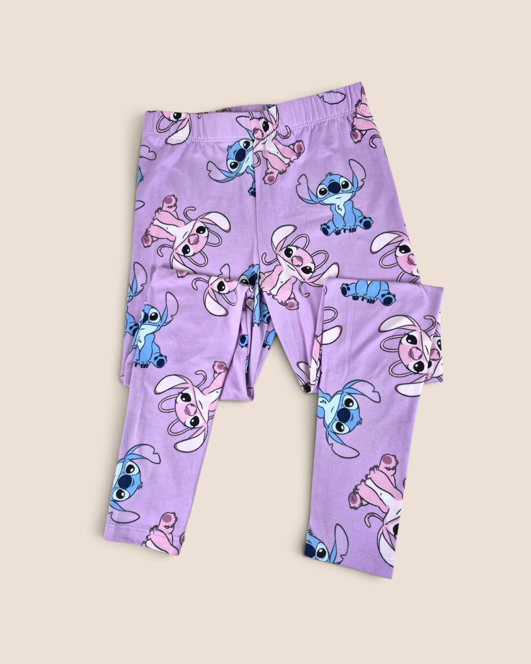 Pre-Loved Stich Purple Leggings Girls 7-8Y | Betty’s Marketplace