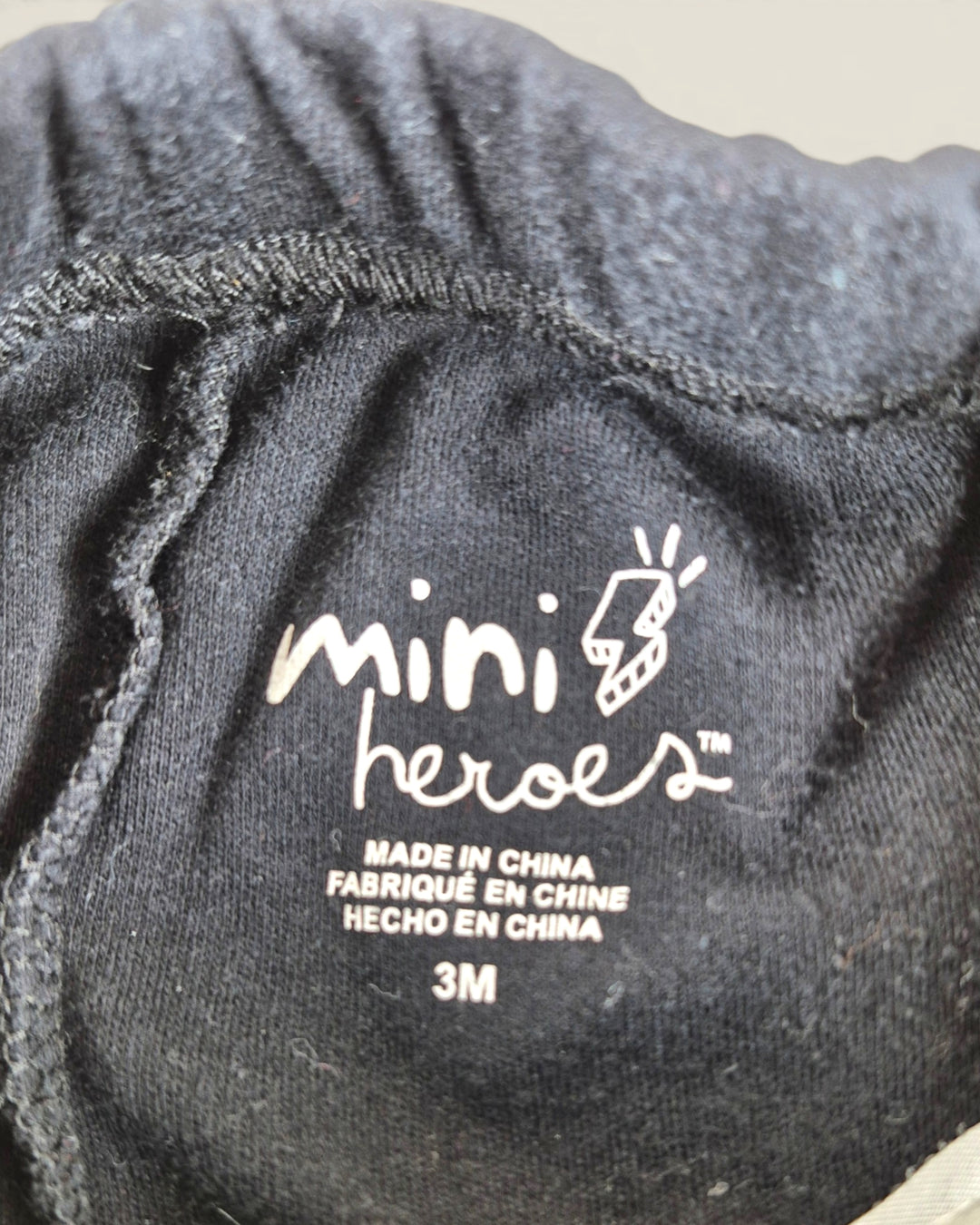 Pre-Loved Mini Heroes Black Footie Pants 3M | Betty’s Marketplace