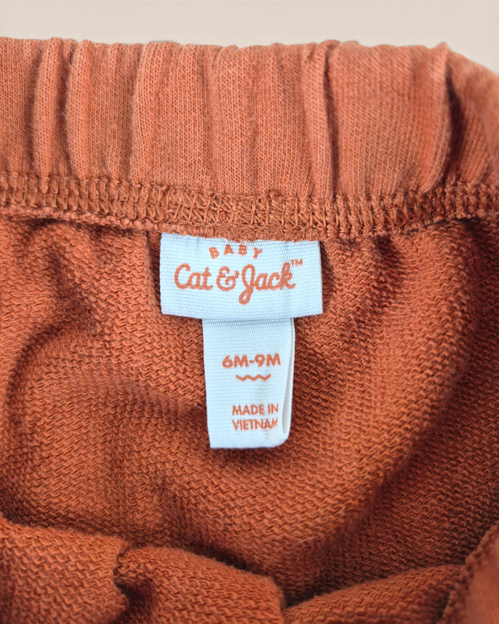 Pre-Loved Cat & Jack Orange Pants 6-9M | Betty’s Marketplace
