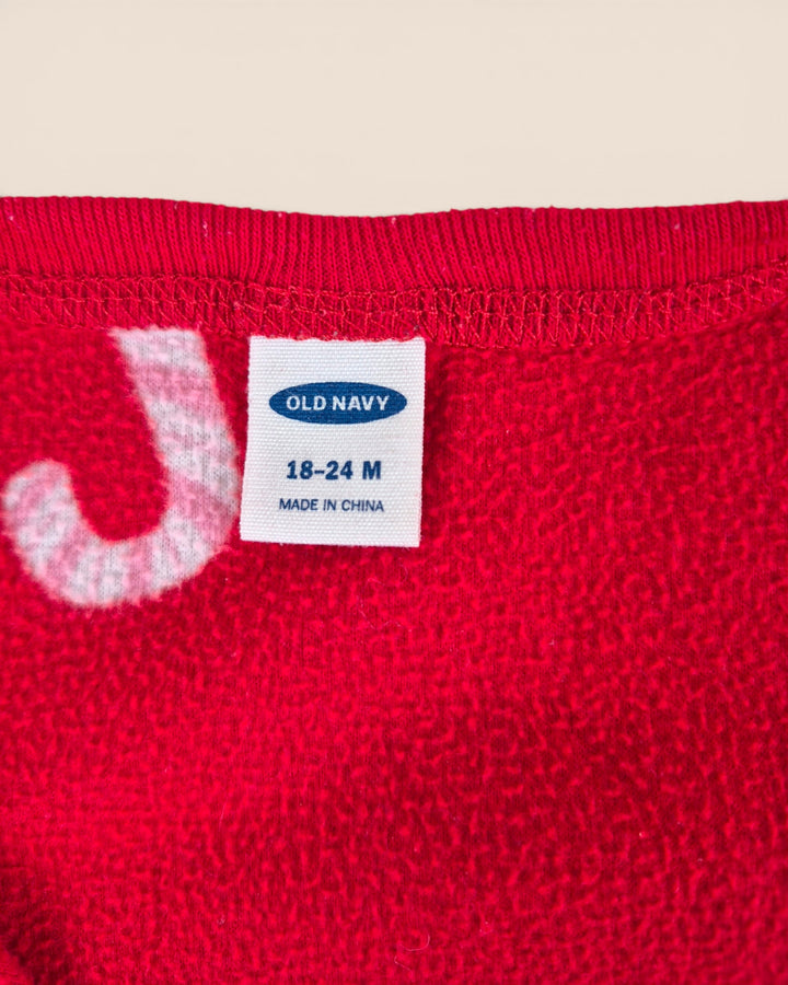 Pre-Loved Old Navy Candy Cane Footies Girls 18-24M | Betty’s Marketplace